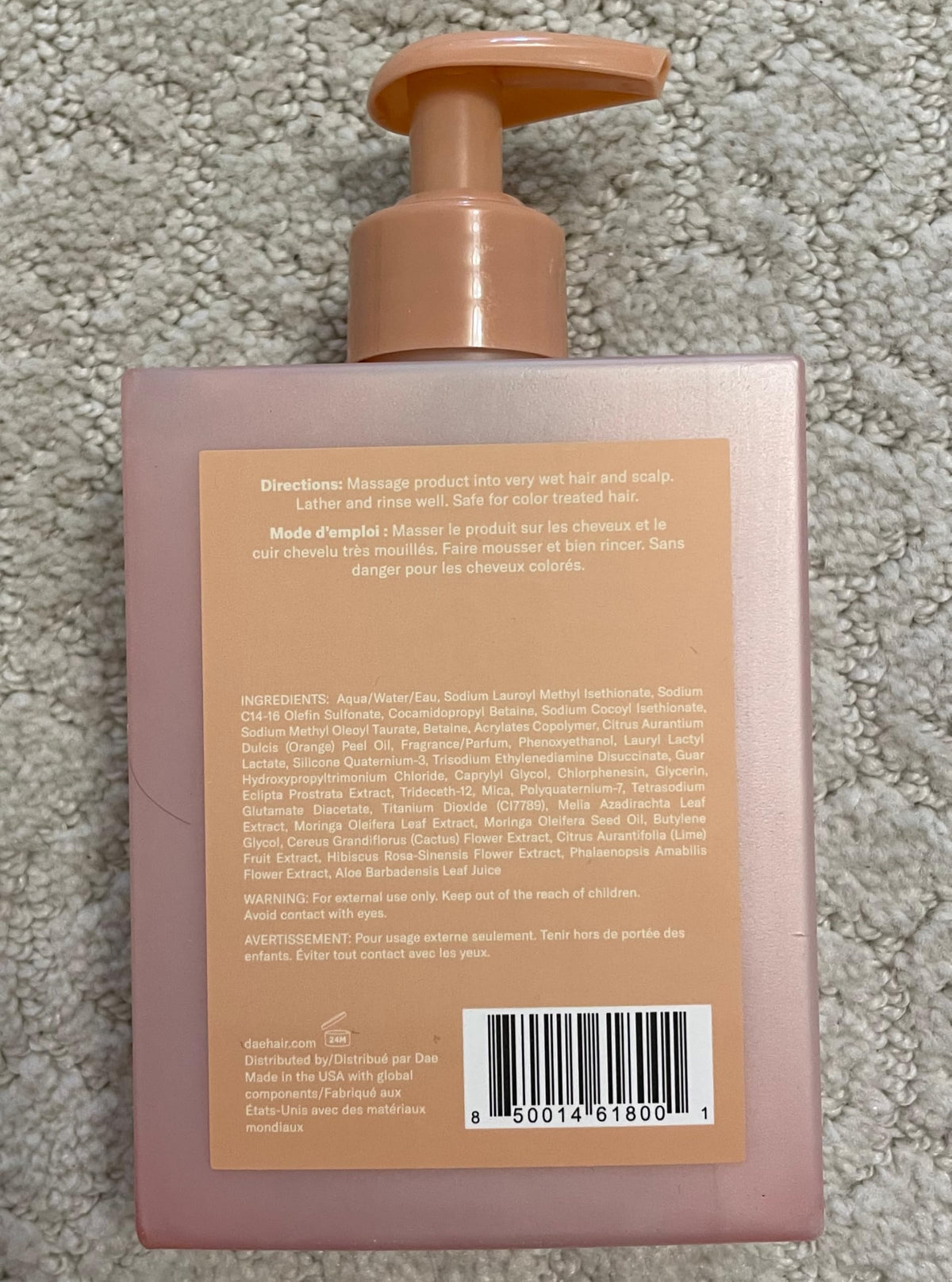 DAE shampoo on bathroom vanity suggesting a stylish routine