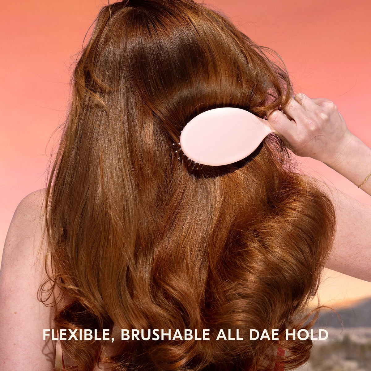DAE Sunsetter applied to styled hair showing long-lasting hold and natural shine