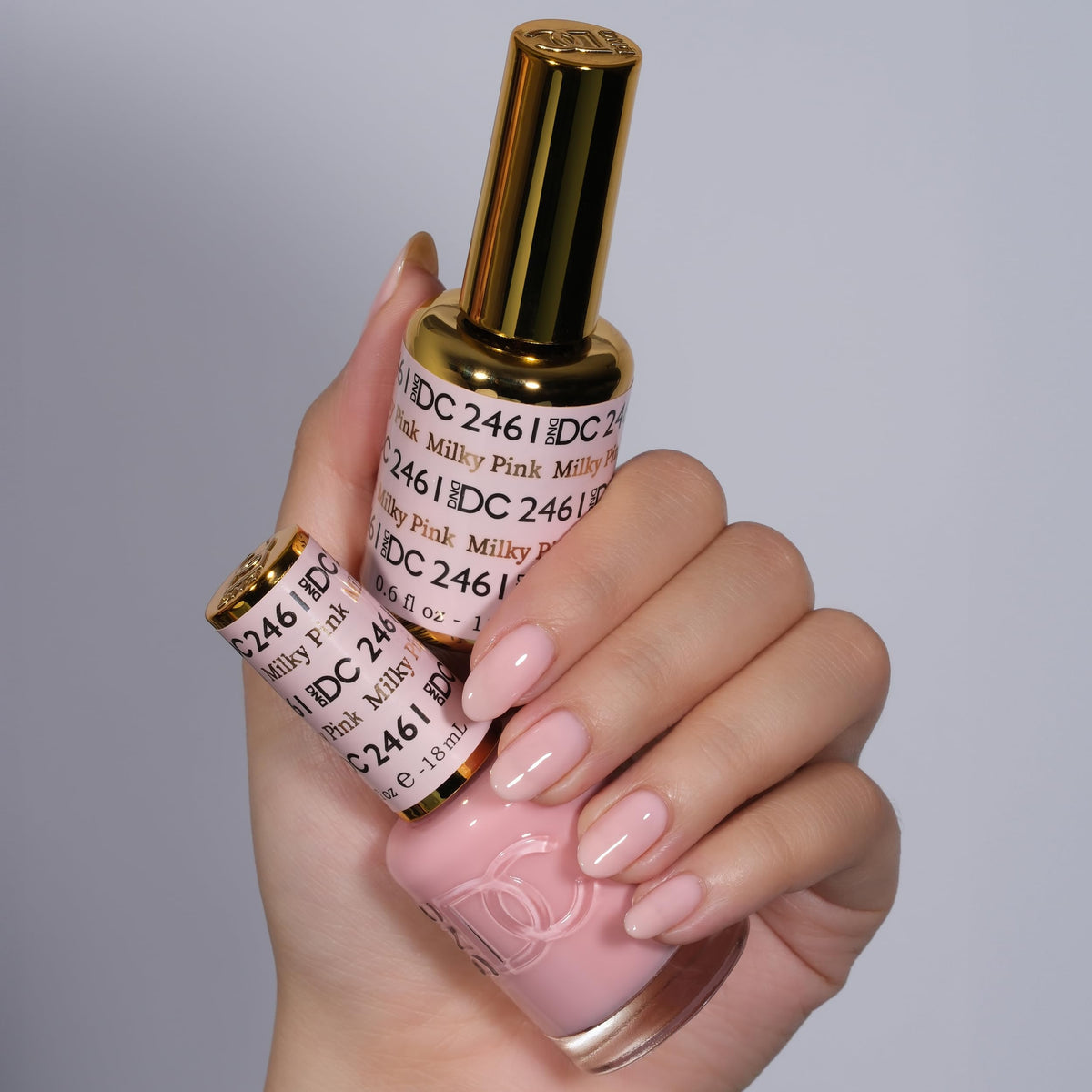 DAISY DND open bottles with brush showing easy application and control