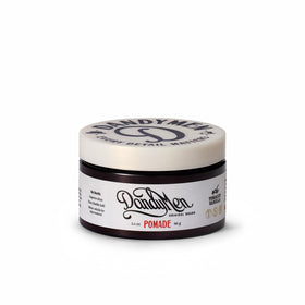 DandyMen pomade jar front view showing branding and sleek packaging for effortless styling