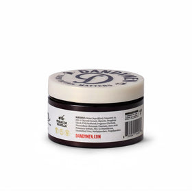 Man using DandyMen pomade in morning routine for polished look before work or events