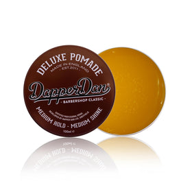 Dapper Dan pomade on hands showing smooth application and quick workability benefit