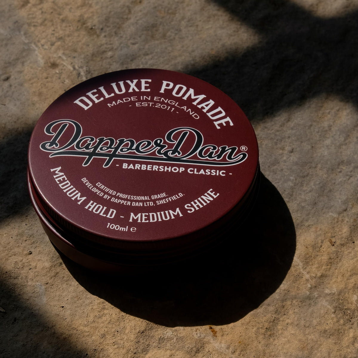 Dapper Dan label close-up highlighting citrus and vanilla scent for pleasant finishing touch