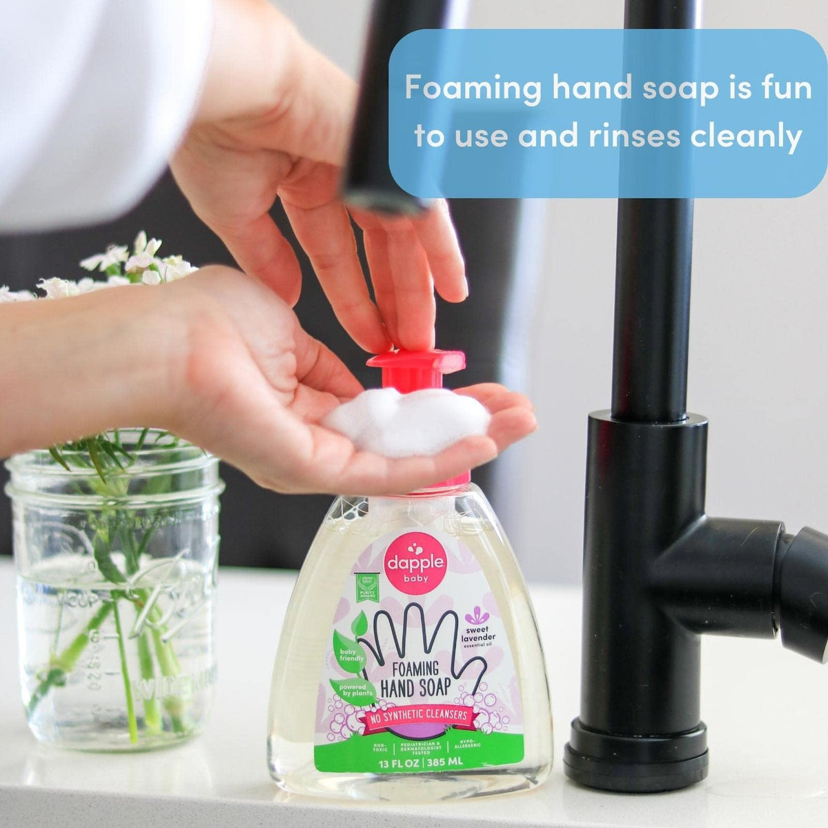 Dapple bottle next to hand for size comparison showing travel-ready benefit