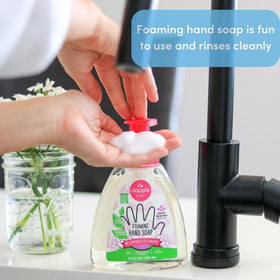 Dapple bottle next to hand for size comparison showing travel-ready benefit