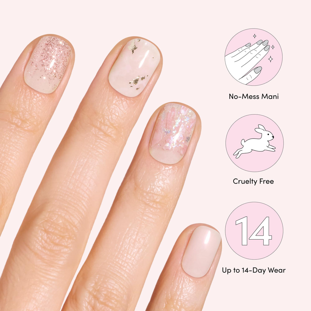 Dashing Diva finished manicure on hands showcasing glossy blush marble nails for polished look