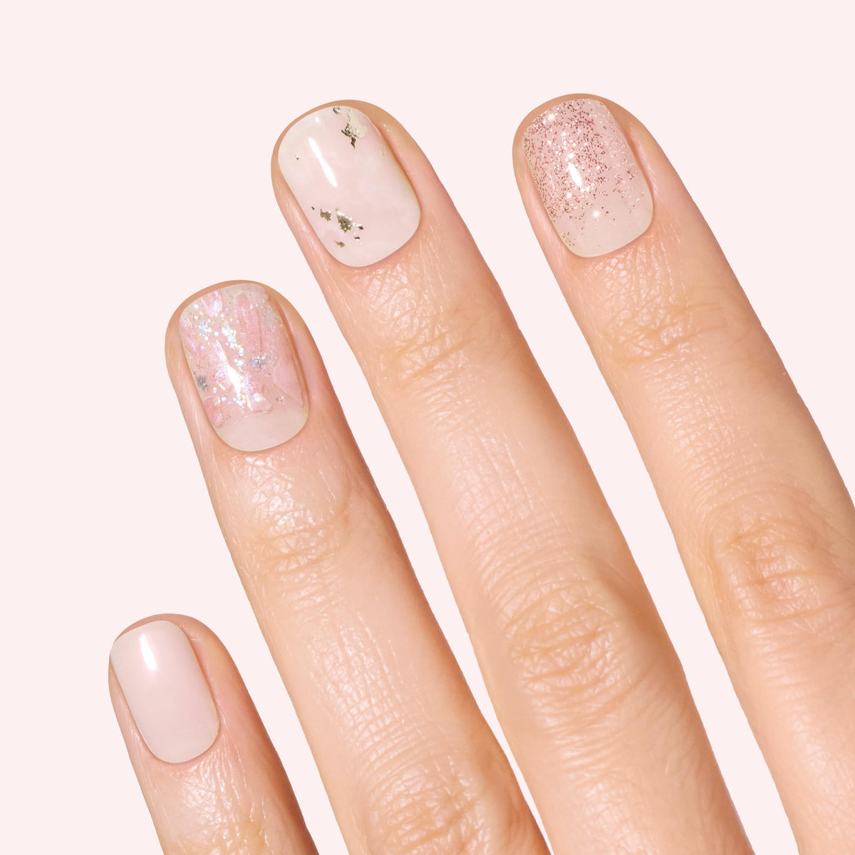 Dashing Diva close-up of nail strip texture showing marble and rose-gold glitter for high-shine detail