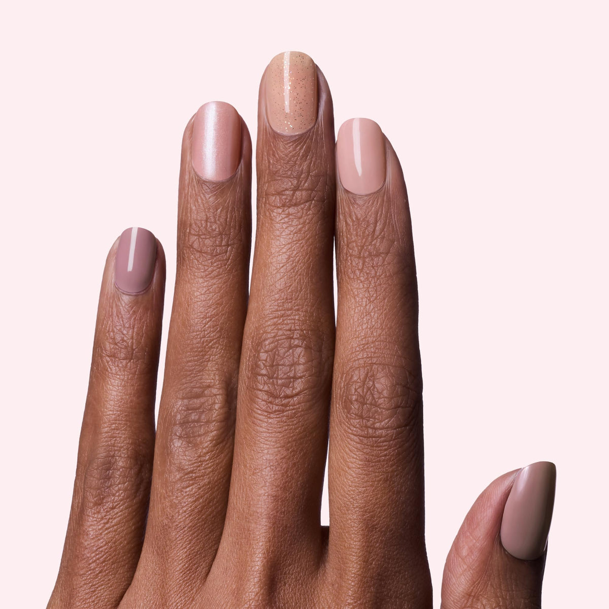 Dashing Diva close-up strip sheet displaying multiple nude shades and sizes for fit