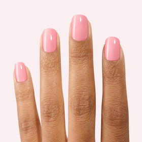 hand wearing Dashing Diva strips being pressed down to demonstrate fast application benefit