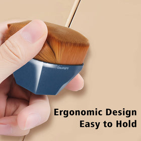Daubigny brush held in hand showing scale and comfortable grip for fast coverage