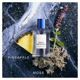David Beckham Classic Blue grapefruit and pineapple close-up conveying bright fruity freshness