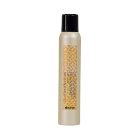Davines bottle front packaging showing product and matte label benefits