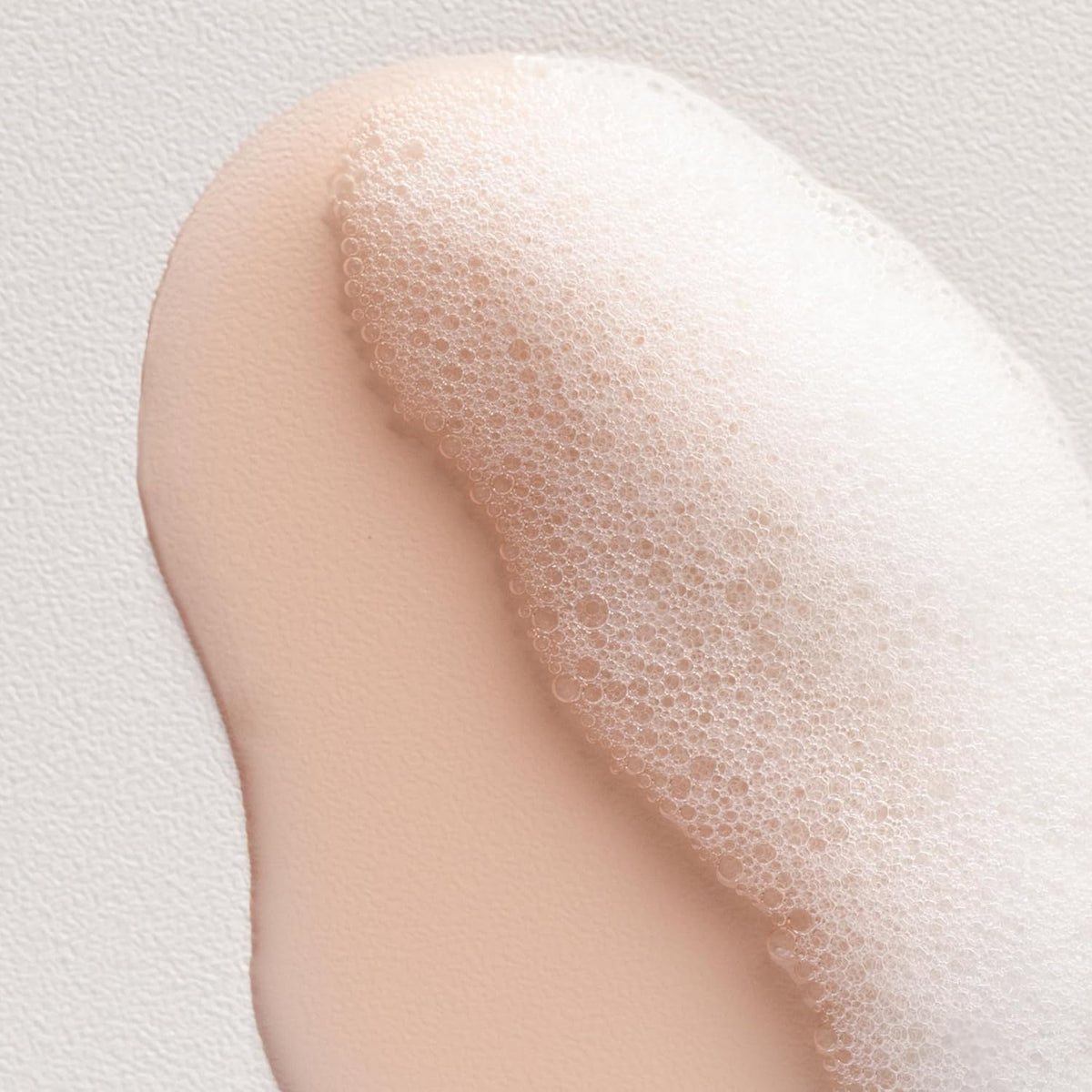 Davines bottle next to a ruler to show 8.45 fl oz size and scale benefit