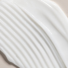 Davines conditioner on bathroom shelf evoking routine convenience