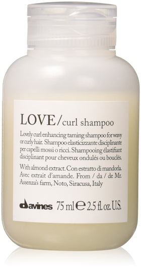 Davines LOVE curl shampoo front packaging showing travel bottle and brand benefit