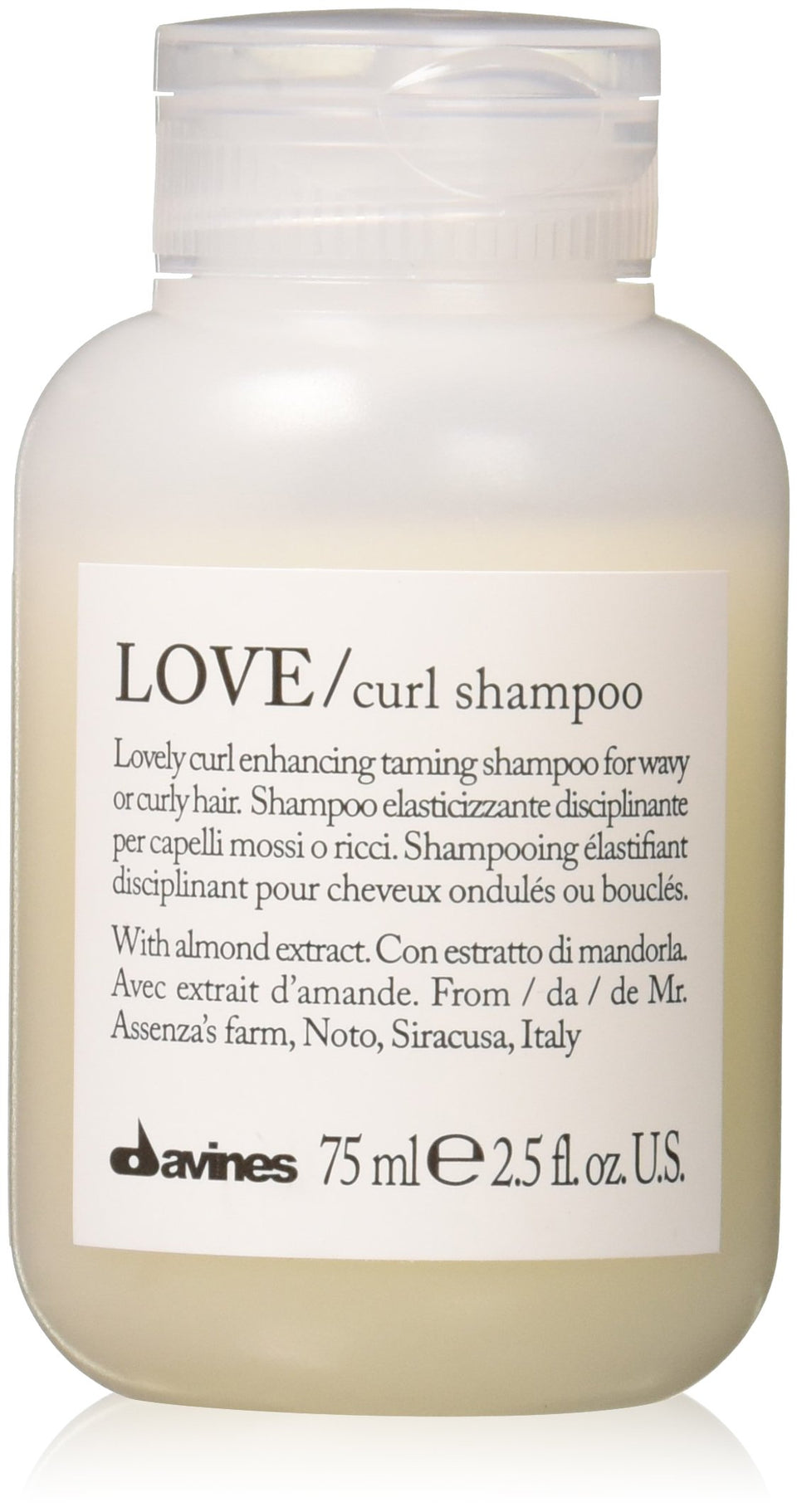 Davines LOVE curl shampoo front packaging showing travel bottle and brand benefit