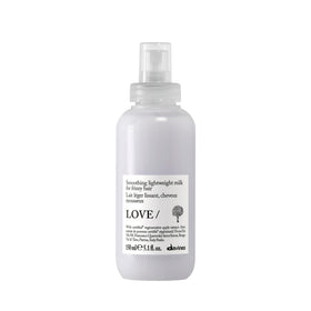 Davines bottle front packaging showing product and benefit