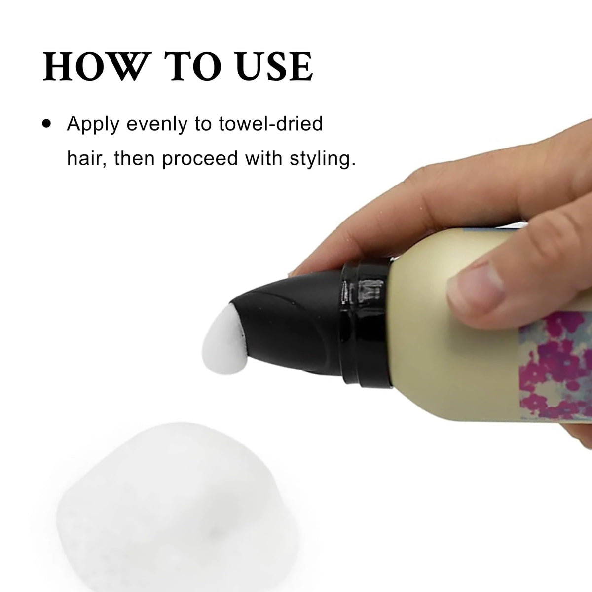 Davines applying mousse to wet curls for defined shape