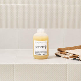 Davines NOUNOU cap detail emphasizing controlled dispensing and convenience