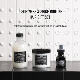 Davines OI All In One Milk travel-size bottle showing lightweight protection benefit