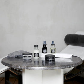 Davines OI Hair Butter placed in bathroom setting illustrating daily routine use