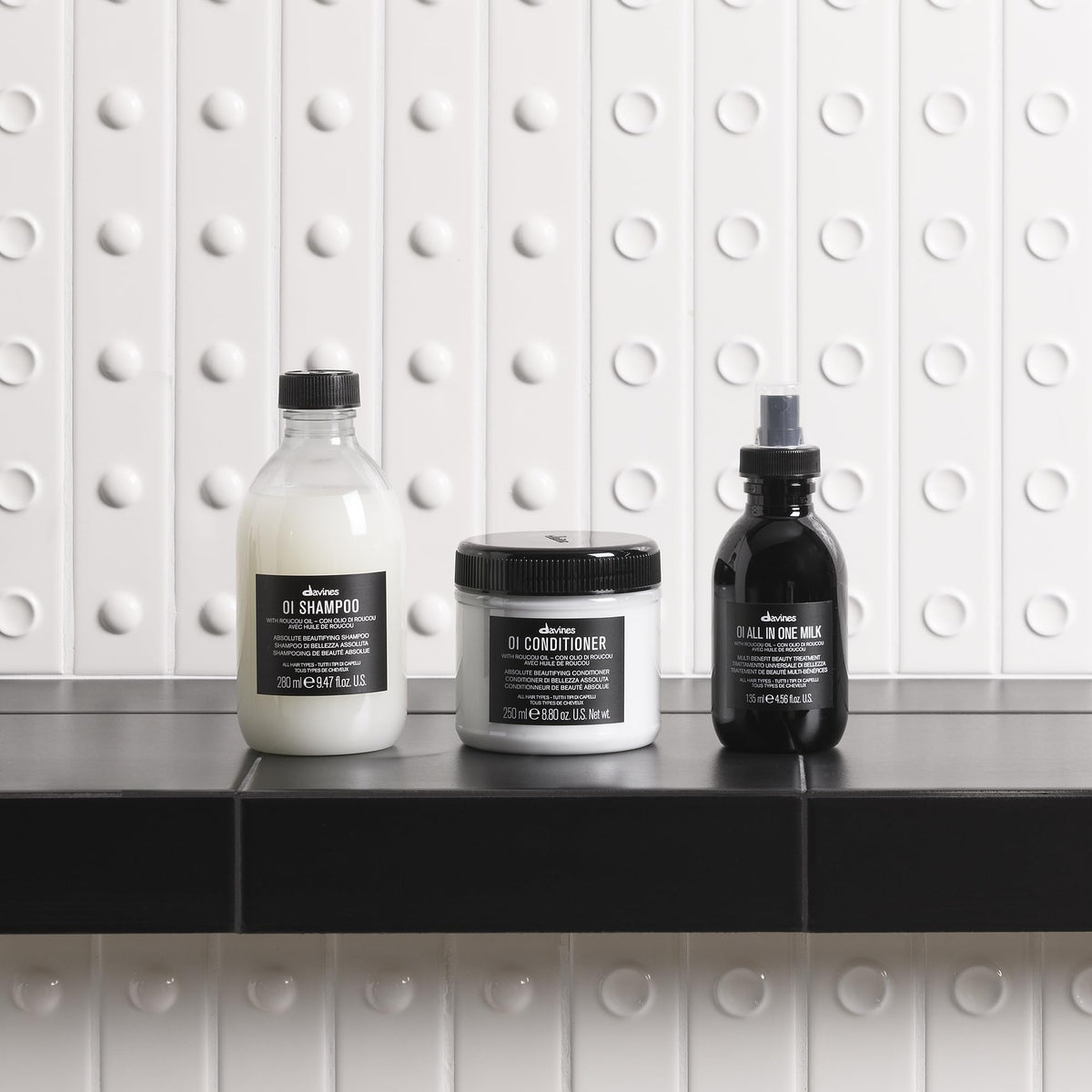 Davines OI before and after image controlling frizz and shine