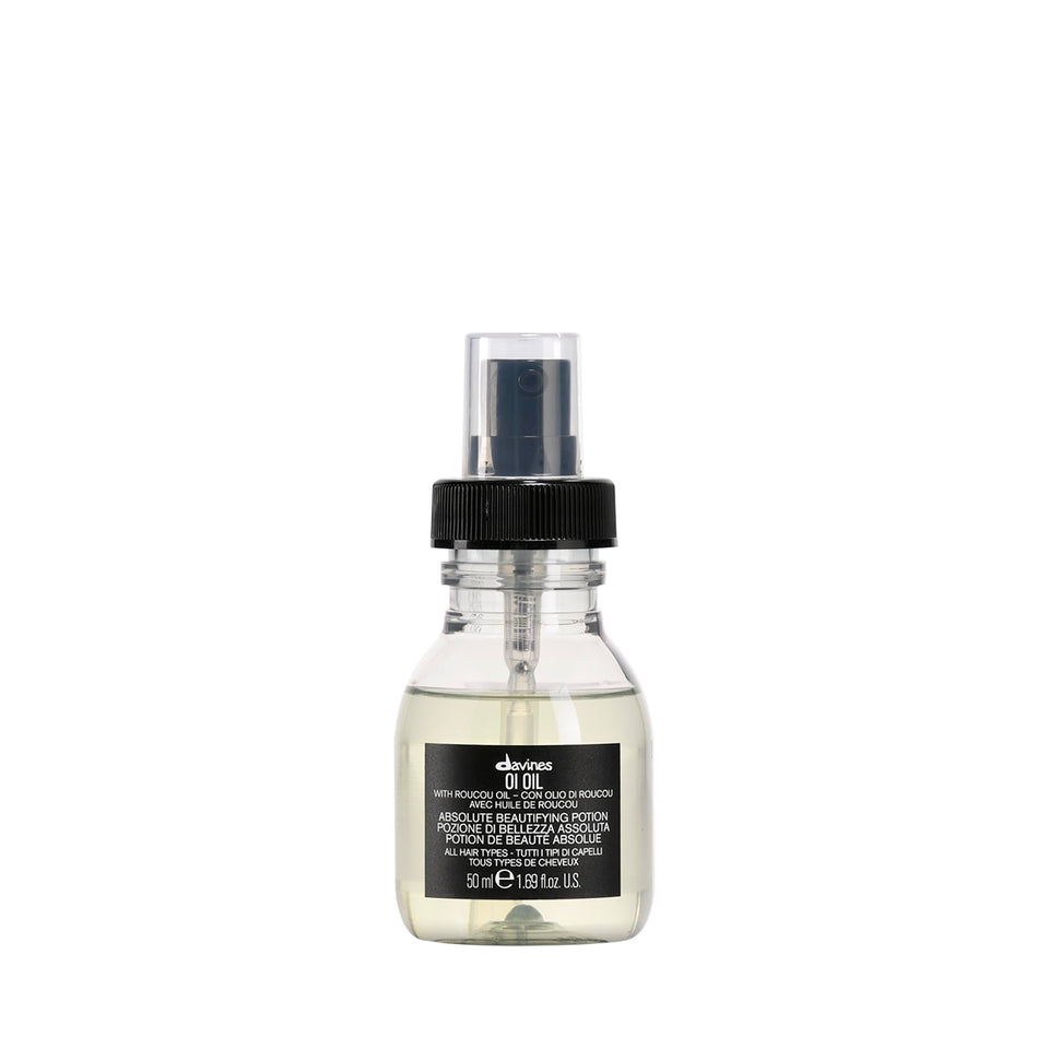 Davines OI Oil front bottle showing travel size and brand sheen benefit