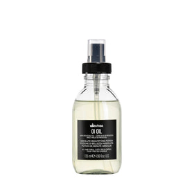 Davines OI Oil front bottle showing elegant packaging and brand benefit