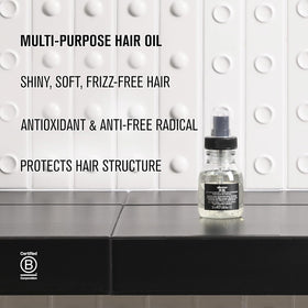 Davines OI Oil next to a coin for size comparison ideal for travel benefit