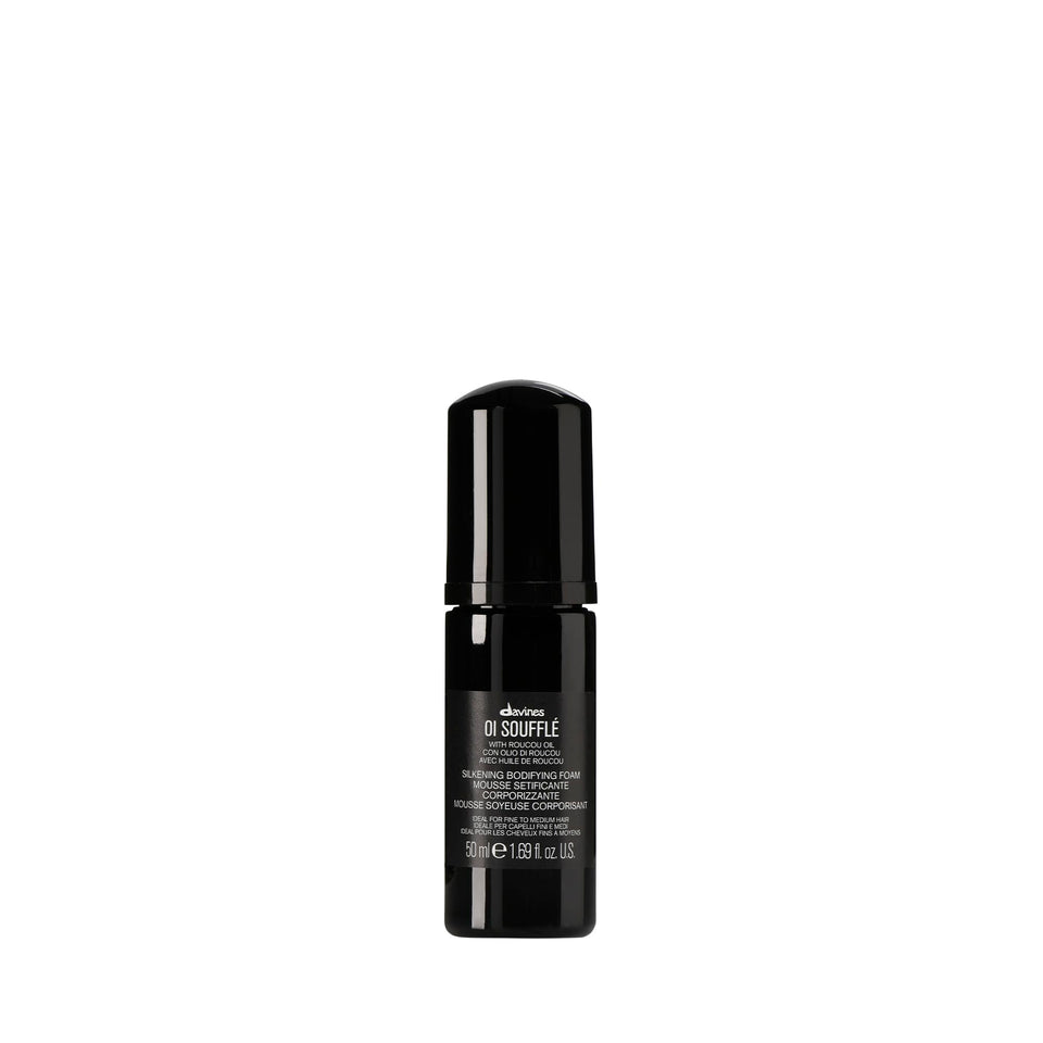 Davines OI Soufflé front travel packaging showing the product and benefit of portability