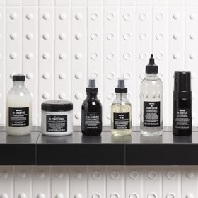 Davines OI Soufflé staged in a bathroom lifestyle scene conveying daily styling convenience