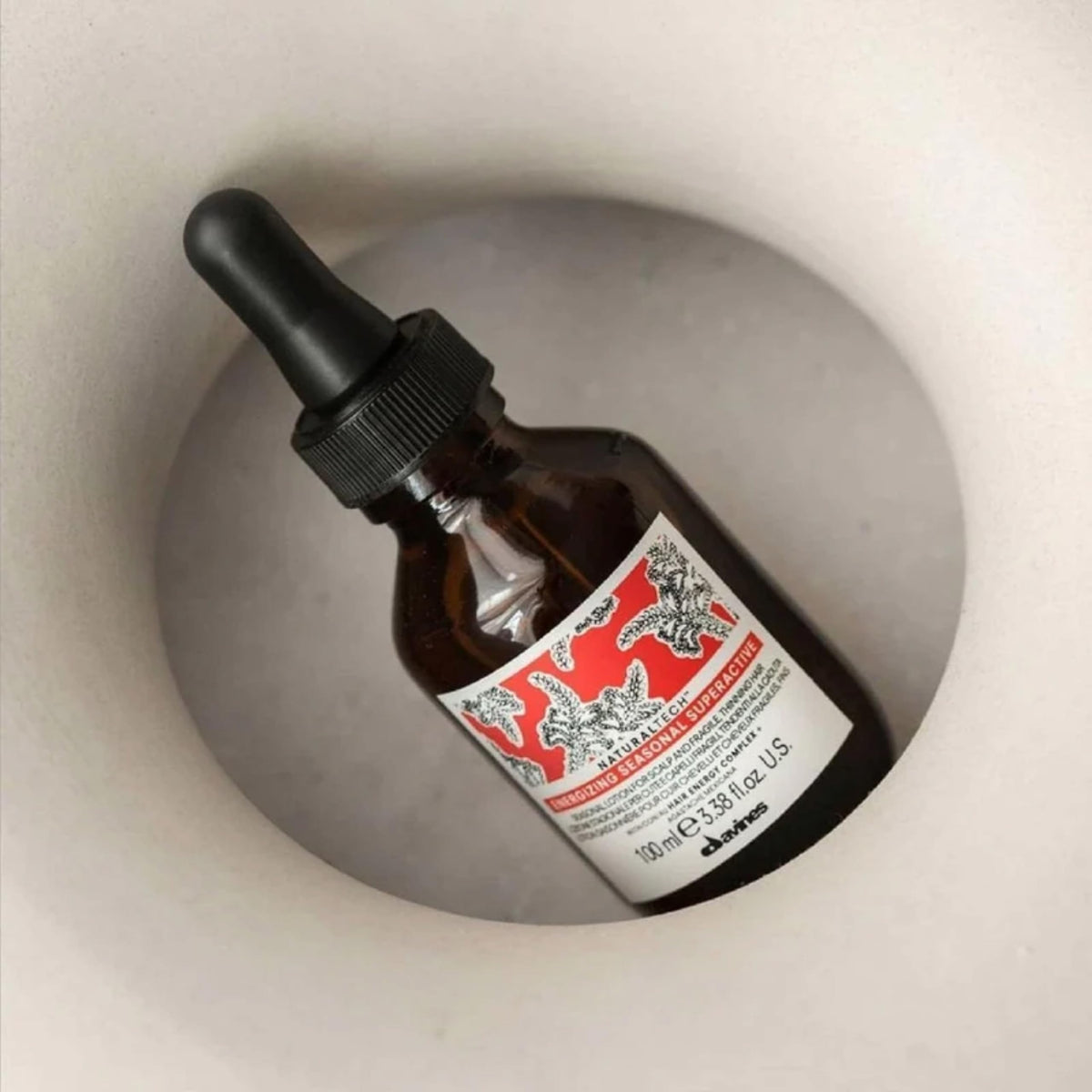 Davines label close-up highlighting active ingredients and formula benefit