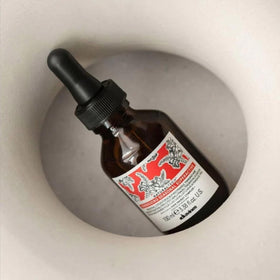Davines label close-up highlighting active ingredients and formula benefit