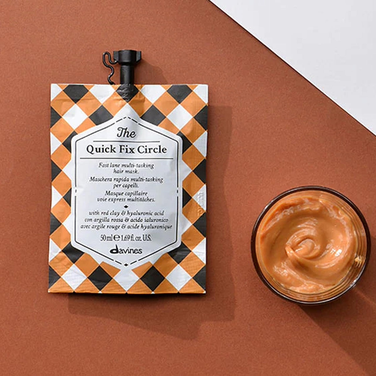 Davines mask on hand demonstrating creamy consistency and hydration