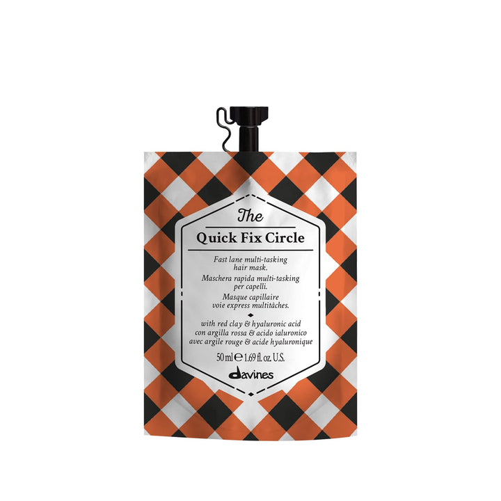 Davines front packaging showing compact travel-friendly tube and benefits