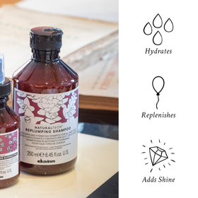 Davines close-up label showing plum phytoceuticals and ingredient clarity benefit