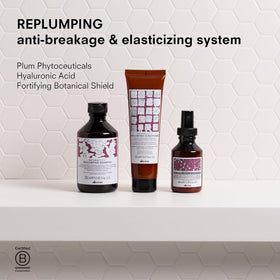 Davines bottle inside shower scene showing ease of use and hydration benefit