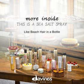Davines spray mist dispersing across hair for instant texture