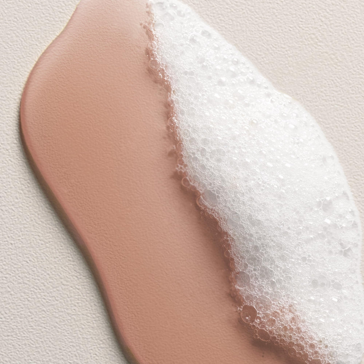 Davines SOLU foam texture close-up illustrating gentle clarifying action