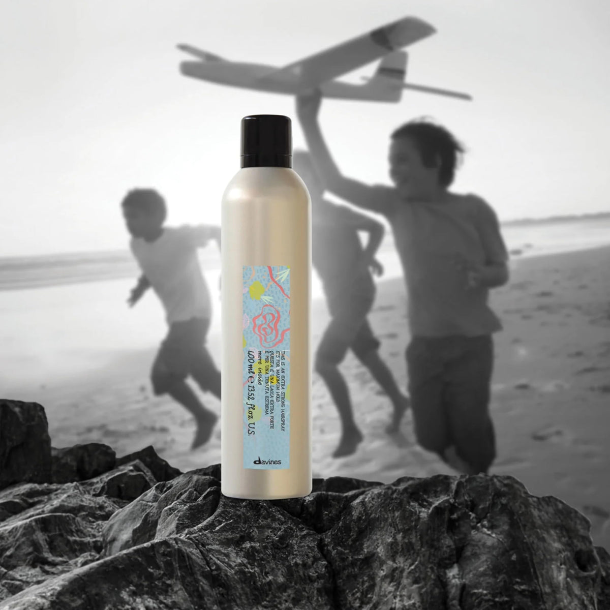 Davines close-up nozzle delivering fine mist for precise application