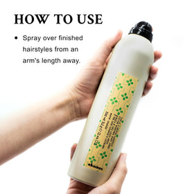 davines spray applied to styled hair to lock shape while keeping movement