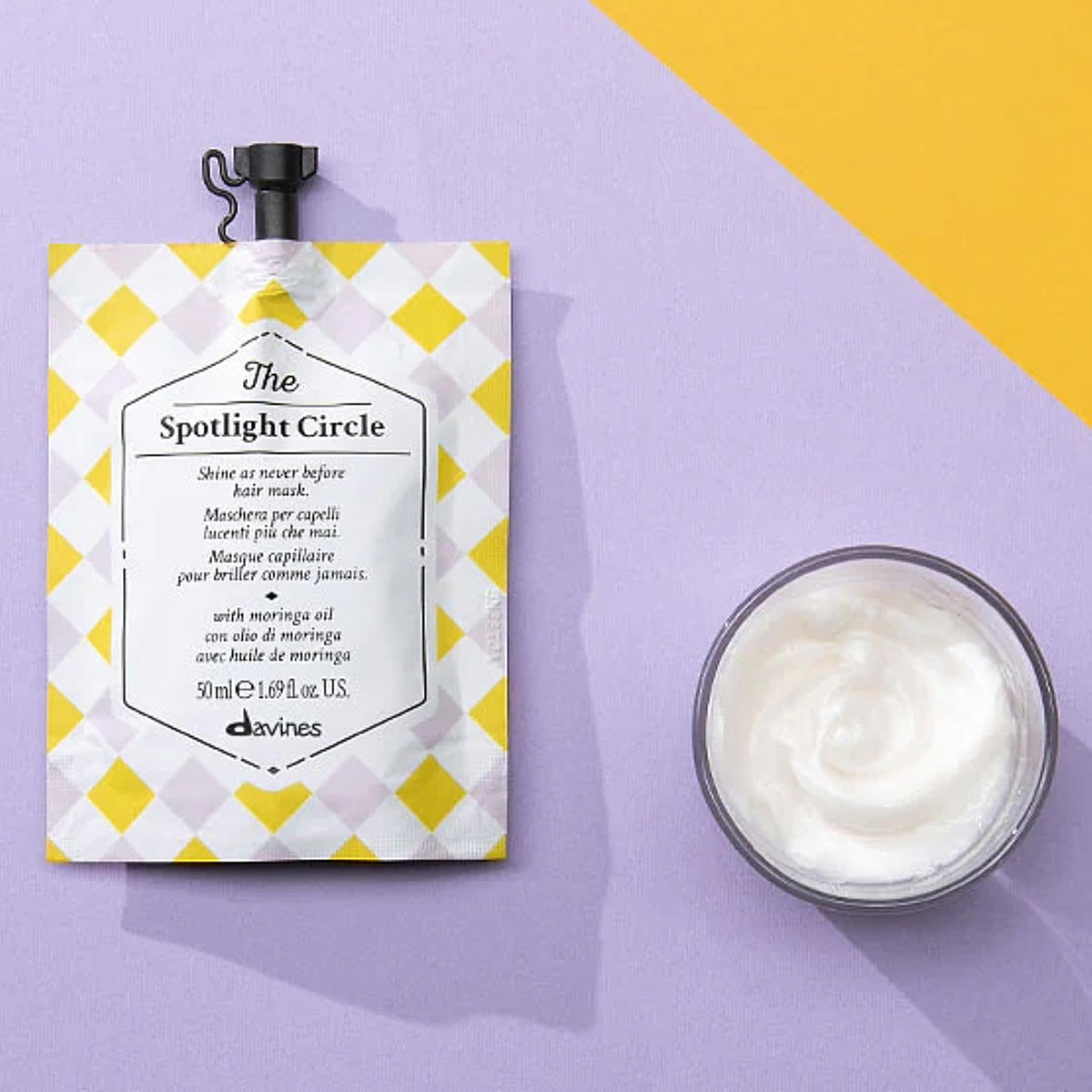 Davines moringa oil ingredient bottle highlighting nourishing shine boost