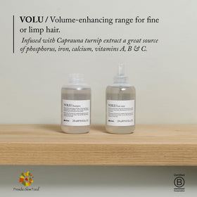 Davines VOLU travel size in hand demonstrating compact convenience