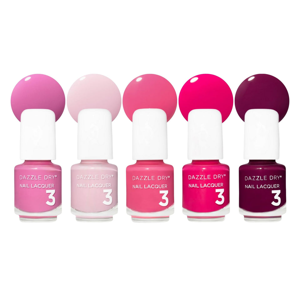 Dazzle Dry pack front showing five mini bottles and vibrant pink plum palette benefits portability