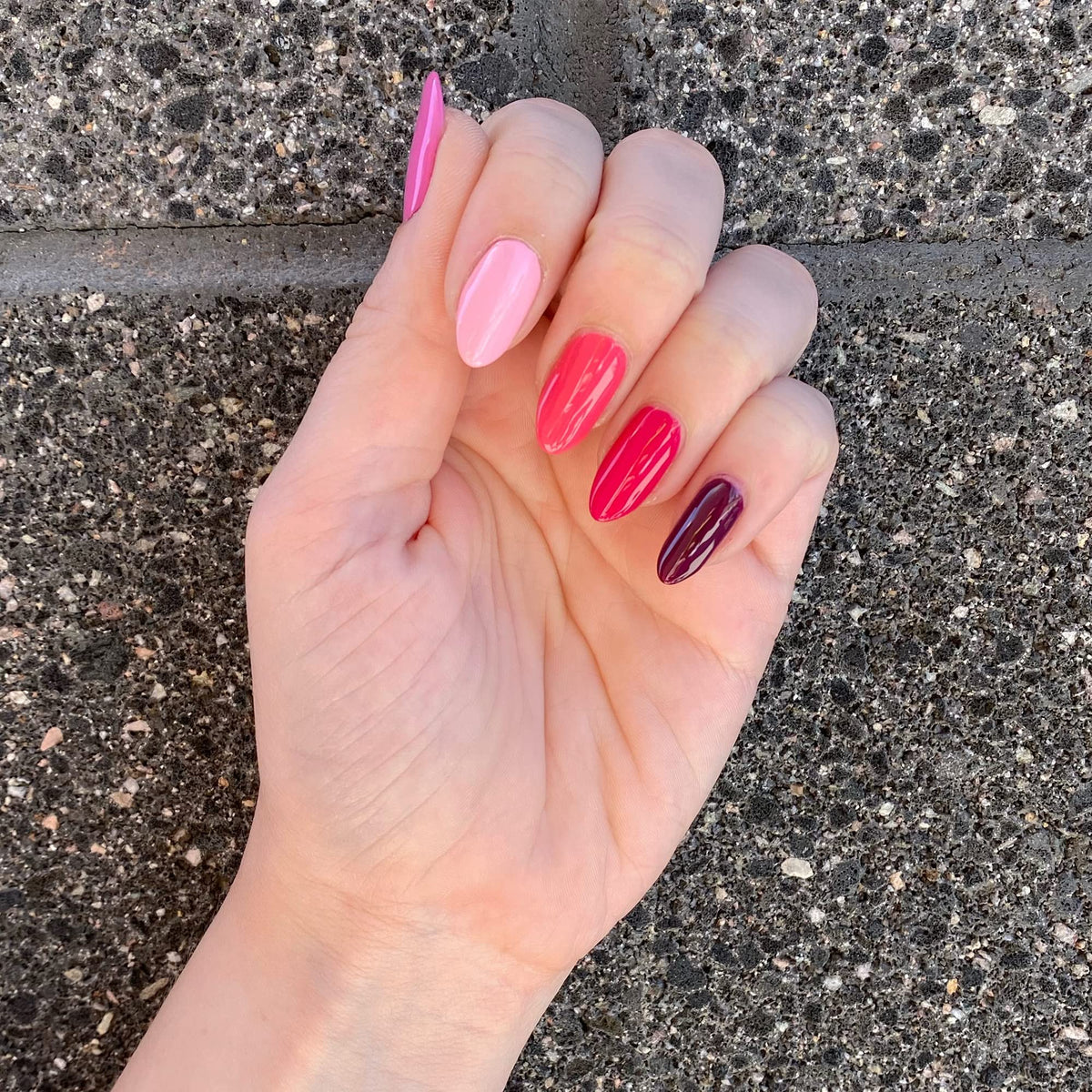 Dazzle Dry hand with fresh manicure demonstrating quick-dry, long-lasting finish