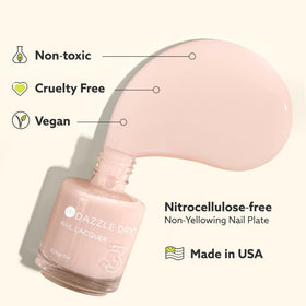 Dazzle Dry nail bottle held in hand for lifestyle, easy-at-home use