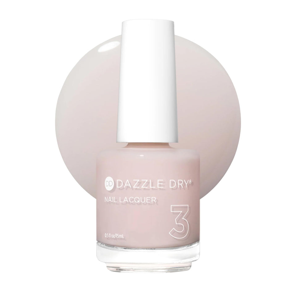 Dazzle Dry bottle front view showing pale pink shade and branding for clear identification