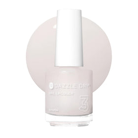 Dazzle Dry bottle front view showing soft pink shade and compact design