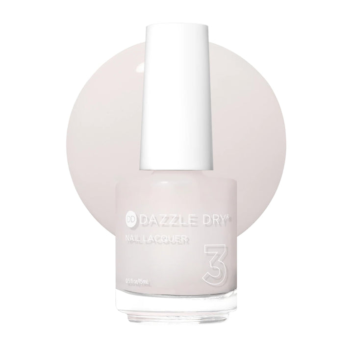 Dazzle Dry bottle front view showing soft pink shade and compact design
