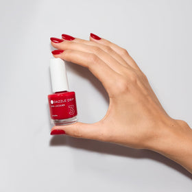 Close-up of Dazzle Dry Rapid Red texture illustrating streak-free coverage